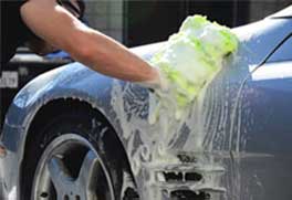 Car being washed at Water Wheel Car Wash